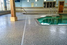 Luxury pool area with decorative concrete coating